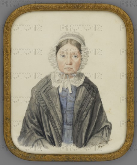 Portrait of Anna Jadwiga Sapieha née Zamoyska 1772–1859 in old age. Painted by Izabela Dzialynska née Czartoryska 1830–1899, amateur painter. En face miniature, 1846, Paris. Elderly woman, straight torso. Gray hair parted in the middle, white bonnet trimmed with a tubular ruffle and tied under the chin. Lace collar at the neck, light sapphire dress, dark gray coat with wide lapels. Background unpainted. Frame: semi-convex rim of oxidized bronze, zinc-plated with plant ornaments. Height 17.0 cm, width 13.8 cm., A framed watercolor portrait of an older woman shown from the chest up against a pale background, wearing a white frilled cap and a lace collar tied with a bow, with her hair parted in the middle and visible at the temples, a neutral facial expression, light skin tones and blue-gray eyes, dressed in a blue garment under a dark gray shawl or coat with visible folds and patterned trim; the frame around the image is ornate and gold in color.