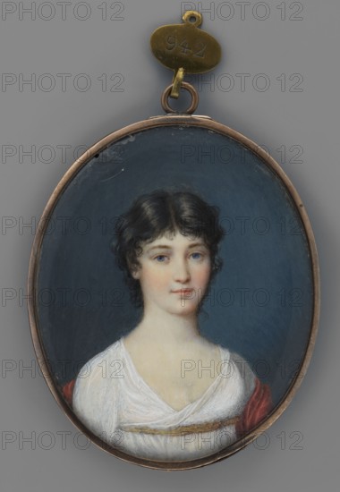 Portrait of a young girl in a white Empire-style dress, shoulder-length portrait, slightly turned to the right; miniature 1825, miniature painting, height 7.2 cm, width 5.9 cm; unknown artist., An oval pendant with a metal frame containing a painted portrait of a young woman against a dark blue background; she has short curly dark hair, pale skin, and light-colored eyes with a neutral expression, and she wears a white garment with a hint of a red drape at one shoulder and a thin decorative band at the neckline; the pendant is attached to a small metal loop and tag, and the overall colors visible include dark blue, white, pale skin tones, dark brown or black hair, red, and metallic bronze or gold.