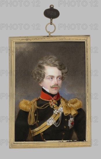 Prince Gustav Vasa born 9 November 1799 in Stockholm, died 4 August 1877 in Pillnitz, Saxony, called Prince Vasa, heir to the thrones of Sweden, Finland, Swedish Pomerania and Rügen 1799–1809, Austrian Field Marshal-Lieutenant from 1836, pretender to the throne of Sweden 1809–1872. Waist-length, 3/4 right portrait; blond hair coiffed; dark green uniform with red insets, gold epaulettes and insignia, orders and order stars; cloudy dark sky background. Inscribed/attributed: Peter, Emanuel 1799–1873 creator?; Daffinger, Moritz-Michael 1790–1849 painter. Miniature with narrow brass rim; 1850, Vienna. Height 10.6 cm, width 7.6 cm. Male sitter; soldiers Swedish uniform, fourragères; portraits up to the elbow; male portrait slightly to the right; rulers; foreign miniatures; provenance notes., A framed portrait of a young man shown from the chest up, wearing a dark military coat with gold epaulettes and gold braided cords, a red collar, and decorative medals and sashes; he has light skin, wavy...
