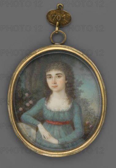 Portrait of a Young Woman in a Turquoise Dress against a Park Background, Kaltiner, Joseph 1758–1824 painter. Seated, almost straight, waist-length portrait visible down to the knees. Right hand resting on a plinth. Brownish-gray hair in loose shoulder-length curls. Turquoise empire-style dress with a white gauze ruffle and a red belt with a meander motif at the waist. Background: wild rose bush and trees against the sky. Portrait of a young woman; foreign miniature. Medium: miniature. Frame: gilded bronze, narrow, convex, profiled border. Date: 1797. Place of origin: Germany. Dimensions: height 6.6 cm, width 5.8 cm. Keywords: roses, trees, dresses, hairstyles, portraits female, almost en face., An oval miniature portrait set in a gold frame with a hanging loop shows a seated woman with pale skin and curly brown hair, wearing a teal dress with a white lace neckline and a red belt; she rests her hands on a pale surface and looks forward with a neutral expression, and behind her are leaf...