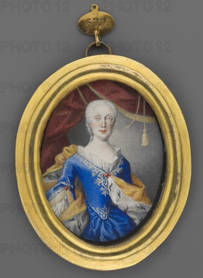 Maria Amelia Habsburg, Archduchess of Austria 1701–1756, unknown painter; knee-length portrait, en face almost, slightly to the right. Subject: older woman, white low wig, gray eyes, sapphire dress with white ruffle and white embroidery, corseted dress, ruby brooches at the neckline and sleeves, earrings, engagement rings, a yellow ermine cloak on the shoulders. Hairstyle: low wig. Background: gray, lightened near the face, magenta curtain with yellow fringes and a tassel. Format and materials: foreign miniature, gilt bronze binding with profiled rim. Date: 1830. Dimensions: height 7.5 cm, width 5.7 cm., An oval gold-colored frame surrounds a miniature portrait of a seated woman wearing a blue dress with ornate gold embroidery and a white ruffled neckline, a gold and white fur-lined cloak draped over her shoulders, pale skin and powdered white hair, a neutral expression, and light-colored eyes; behind her is a dark red drapery with gold trim and a gray background, and the frame is atta...