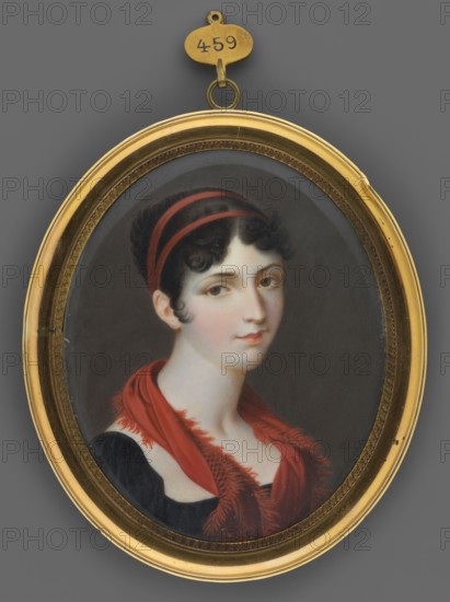 Portrait of a Young Girl, Robert Theer 1808–1863, painter. Miniature portrait shoulder-length, 3/4 right of a young woman with an antique so-called Greek hairstyle with ribbons, wearing a dress with a diamond neckline, rüschka and scarf. Foreign miniature, dated 1825, Vienna. Height 9.3 cm, width 7.7 cm., An oval framed portrait of a young woman with pale skin and dark curled hair held back by a red headband, wearing a dark garment and a red scarf with fringed edges draped around her shoulders; the miniature sits within a gold oval frame with decorative inner trim and a small gold hanging ring at the top. Colors visible include gold, red, black, dark gray, pale skin tones, and a muted background gray.
