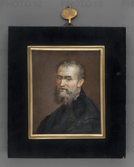Michelangelo Buonarroti; Wilhelmine Louise Thil 1782–1819, painter; copies; portraits left, shoulder-length; male portraits Michelangelo Buonarroti; foreign miniatures; repossession provenance; repossession Jelenia Góra; 1820; miniature; height 9.0 cm; width 6.5 cm., A framed portrait of an older man with a beard and short hair, wearing a dark garment, set against a brown background; the man’s face shows light skin tones and gray in his beard and hair, and his eyes look slightly to one side. The portrait is mounted in a light-colored inner frame surrounded by a wider black rectangular outer frame with a small metal hanging fixture at the top that appears gold-toned. The visible colors include brown, black, gold, gray, and skin tones.