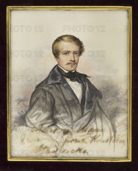 Maurycy Mann 1814–1876, writer, publicist, politician, co-editor of the newspaper Czas, accompanied Adam Potocki on his trip to the Middle East and Egypt; natural son of Stanislaw Wodzicki, president of the senate ruling the Republic of Kraków. Half-length figure facing right, fair hair, white shirt, black cravat with emerald trim, dark grey frock coat and coat. Miniature, 1840–1845, Poland. Height 13.2 cm, width 10.4 cm. Binding: velvet, brown leather. Artist: Kurowski, Józef Szymon 1809–1851., A framed painted portrait of a man shown from the waist up wearing a dark gray coat, a white shirt, and a dark green scarf tied at the neck, with light brown hair, a mustache, and a neutral expression; the background is a pale, cloudy wash in off-white, beige, and light gray tones, and the frame around the image is gold with a surrounding dark brown mat.
