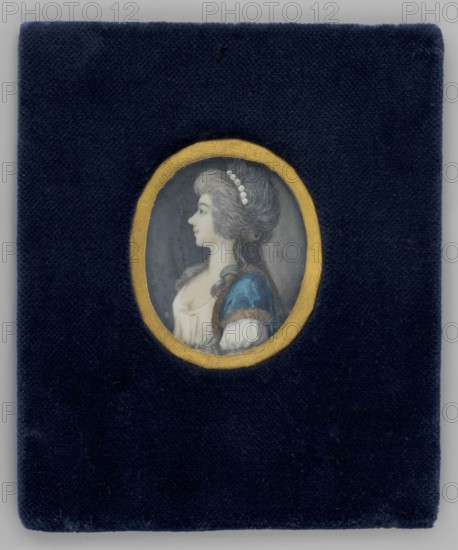 Catherine Romanovna Vorontsov 1743–1810, wife of Michael Ivanovich, Prince Dashkov; headed the Imperial Academy of Sciences during the time of Catherine II; author of memoirs. Miniature portrait, 1777, Russia. Profile bust of a woman: high hairstyle, dark powdered hair decorated with white pearls. She wears a white dress à la chemise and a blue Levantine outer trimmed with fur. Inscription on the reverse: Princessa CR Daszkowa 1777. Miniature, height 4.8 cm, width 4.0 cm. Unknown artist. Secondary binding. Genres/themes: jewellery, aristocracy, costumes, hairstyles, profiles portraits, women., A small oval portrait set against a dark navy textured background shows a left-facing woman with pale skin and greyish hair styled high and adorned with a row of round white ornaments; she wears a low white garment visible at the neckline and a blue sleeve with brown trim, and the portrait is framed by a gold oval border.