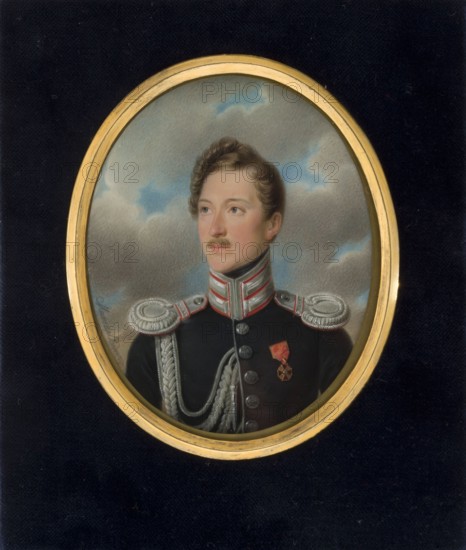 Portrait of a captain of the troops of the Kingdom of Poland. Direct bust, head 3/4 to the left. Dark-blond hair, short, in ringlets above the forehead, with flat wisps on the left temple. Navy blue uniform with silver buttons, collar and aiguillettes with a narrow red inset. The Order of St. Anne on the left breast. Background of grey clouds and blue sky. Frame: gilded bronze; oval rim with a triangular gilt bronze border in a rectangular frame, in a dark green leather case. Inscription on the scientific card identifies the sitter as someone from the family of Olga de Vilde. 1840, Warsaw. Miniature, height 11.1 cm, width 8.8 cm. Painter: Stanislaw Marszalkiewicz 1789–1872. Genres: three-quarter portrait, male portrait, soldiers, Polish miniature., An oval portrait set in a gold frame against a black background shows a light-skinned young man with brown hair and a small mustache, wearing a dark military-style coat with silver shoulder epaulettes and braided cords, a high collar with re...