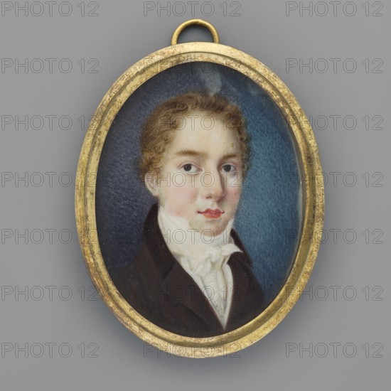 Portrait of a young man, unknown artist, painted in Krzeszowice Lesser Poland Voivodeship, 1810; miniature, height 5.0 cm, width 3.8 cm; subject: male portrait, three-quarters view., An oval miniature portrait set in a worn gold frame hangs against a gray background, showing a young person with light skin and short curly light brown hair, a neutral expression, and visible blue eyes; they wear a dark coat and a white high-collared shirt with a tied neckcloth, and the painted background inside the frame transitions from dark blue to a lighter blue near the face.