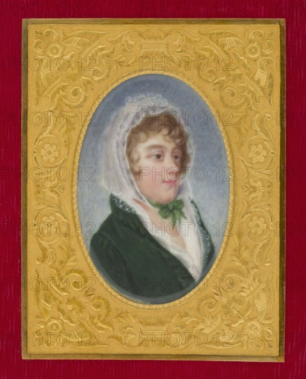 Konstancja Poniatowska 1759–1830, daughter of Kazimierz and Apolonia née Ustrzycka, wife of Ludwik Tyszkiewicz; miniature portrait, 1795, France. Bust facing right, almost in profile; white lace bonnet tied with a green bow under the chin, light hair in curls, dark green redingote, white shawl and blouse. Background: blue, sky. Gilded filigree frame in red morocco pocket book. Size: height 5.4 cm, width 3.7 cm., An oval portrait of a person wearing a white lace head covering and a dark green garment is centered within an ornate gold frame set against a deep red background; the person has light skin, short curly brown hair, and a green ribbon tied at the neck, with soft shading of pale pink on the cheeks and lips and a muted bluish-gray backdrop inside the oval, while the gold frame features raised floral and scrollwork decorations in warm yellow-gold tones.