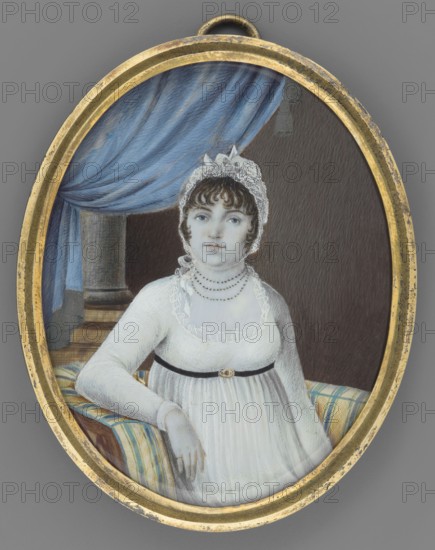 Portrait of a woman sitting in an armchair, unknown painter. Half-length, 3/4 right view; dark hair with white lace on the head; three strings of pearls at the neck. Wearing a white long-sleeved Empire dress with a black belt and decorative gold buckle at the bodice, and a ruffle around the neckline. Left hand resting on an armchair upholstered with blue and yellow/gold stripes. Jewellery, headgear, interiors, furniture armchair, curtains. Unfinished miniature. Background: left side shows a blue curtain and fragment of a column; right side is a uniform dark background slightly brightened around the head. Frame: narrow brass frame. Date: 1810. Medium: miniature. Size: height 7.7 cm, width 6 cm., An oval portrait set in a worn gold frame shows a seated woman wearing a white dress with a black waist band and a lace cap; she has pale skin, brown curly hair, and a neutral expression, with a string of dark beads around her neck and a bracelet on her wrist. The background includes a blue drap...