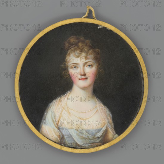 Tatiana Vasilievna née Engelhardt, Princess Yusupov 1769–1841, daughter of Vasily Andreevich Engelhardt and Maria Helena Potemkin; painted by Domenico Bossi 1765–1853; en face half-length female portrait, almost straight; light hair in a Greek hairstyle; wearing a deep-breasted blue dress with a lace ruffle at the neckline, a double pearl necklace, and an embroidered ecru muslin shawl on the shoulders; dark background lightened around the head; narrow gilded bronze border; miniature, 1804, St. Petersburg., A circular framed portrait showing a woman from the chest up against a dark background, with a gold outer frame and a small hanging loop at the top; the woman has light skin, rosy cheeks, light-colored eyes, and brown hair styled up with curled fringe, wearing a light blue and pale pink translucent shawl over a pale dress and a few strands of pearls around her neck, with the dominant colors being black, gold, gray, light blue, pale pink, brown, and white.