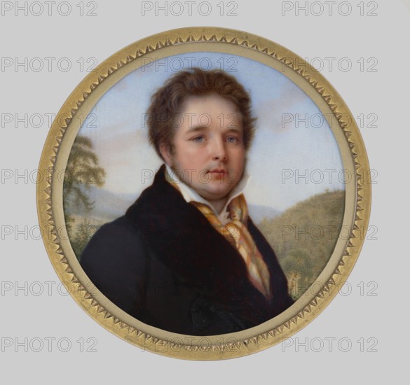 Portrait of Artur Stanislaw Count Potocki 1787–1832 from Krzeszowice; miniature by Joseph Heigel 1780–1837, 1823. Bust three-quarters right; short dark hair, sideburns. White shirt with a parted collar, yellow scarf with orange and green checks loosely tied around the neck, navy blue coat with a brown collar. Background: mountain landscape and sky. Narrow, flat binding with ornamented gilt-bronze rim. Joseph Heigel studied at the Academy of Fine Arts in Munich, later worked in Paris and exhibited at the Salons from 1817 to 1837., A painted portrait of a man shown from the chest up within a round decorative frame, featuring a pale blue sky background and distant green hills and trees. The man has light skin, brown wavy hair, and a neutral expression. He wears a dark coat with a high collar and a patterned scarf in shades of yellow and cream around his neck. The frame is gold with a textured zigzag inner border, and the overall color palette includes pale blue, green, brown, dark black o...