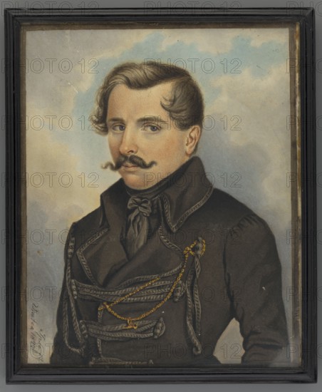 Self-portrait in a czamara by Roman Wilczynski 1807–1857. Watercolor miniature height 15.5 cm, width 12.7 cm, dated 1842. Half-figure, three-quarter left. Dark blond hair and mustache, dark blue eyes. Wearing a dark brown cravat and scarf and a dark czamara with lighter loops; gold chain on the left breast. Background: blue sky and yellowish-gray clouds. Inscription left at the bottom: Ipse ft/Viatca 1842. On the reverse the inscription is repeated twice: Exiled painter, aquarelist / Wilczynski / self-portrait. Narrow profiled ebony strip frame, damaged. Associated with exile to Siberia and the November Uprising 1830–1831., A framed painted portrait of a man shown from the chest up against a cloudy background with pale blue and beige tones. He has light brown hair styled with a wave and a dark curled mustache, and his skin shows warm peach and beige tones. He wears a dark coat with decorative braided trim and a tied dark scarf at the neck, and several gold-colored chains drape across t...