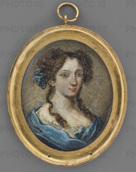 Portrait of Zofia Lekawska, unknown artist, amateur painter. Miniature portrait, bust three-quarters to the right. Dark blond hair with two flat knots of braids on either side at the top of the head, a bunch of blue ribbons at the right temple; two strands of hair on the shoulders and neckline ending in spiral curls. White ruffle at the bodice; pleated blue fabric shawl or coat? on the shoulders and breast. Olive-ash background. Binding: profiled, recessed rim, gilded brass. Identification of the portrayed subject according to an old inventory card. Dated 1750, Poland. Height 6.8 cm, width 5.6 cm., An oval pendant with a gold-colored frame and loop enclosing a painted portrait of a woman with pale skin and brown curly hair tied back with a blue ribbon, wearing a blue garment with a pale neckline; the background inside the frame is a muted gray-brown and the overall visible colors include gold, blue, brown, pale flesh tones, and gray.