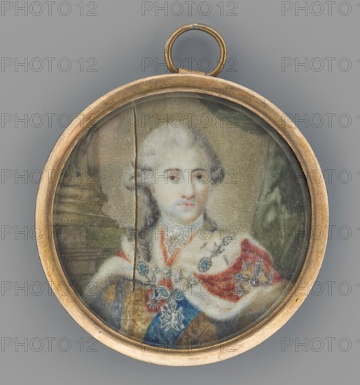 Portrait of King Stanislaw August Poniatowski in coronation robes after Marcello Bacciarelli, by Kaminski fl. ca. 1800–1850. Miniature ca. 1800–1900, Poland. Bust slightly turned to the right. Gray powdered wig, dark eyes. White shirt and jabot; red ribbon of the Order of St. Stanislaus and blue ribbon of the Order of the White Eagle at the neck. Gold tailcoat; crimson ermine-trimmed cloak bearing a gold star and silver-blue chain Order of the Black Eagle. Background yellowish with column and gray-olive curtain. Binding: gilt bronze, narrow flat rim. Height 4.6 cm, width 4.5 cm., A small round pendant with a thin metal frame and a loop at the top contains a painted portrait of a person shown from the chest up. The person has pale skin and powdered hair in a light gray color, and they wear a white high-collared garment under a fur-trimmed cloak that has red and white areas and a blue sash. Decorative jewelry and ornate medallions in blue and metallic tones are visible on the clothing. T...