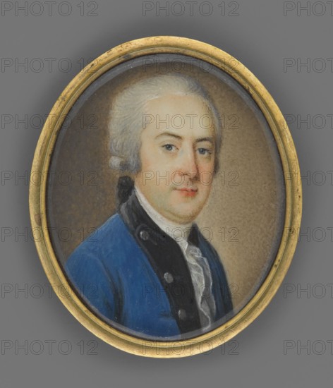 Portrait of a man in a sapphire tailcoat, portraits 3/4 right, costumes, hairstyles wig, male portrait, bust 3/4 right, gray wig with a ponytail, dark eye rim. Light sapphire tailcoat with black collar and lapels, white cravat and jabot, silver buttons. Background gray-brown, lightened on the right. Framing: secondary, narrow brass border. 1780, miniature, height 3.9 cm, width 3.3 cm. Unknown artist., An oval miniature portrait set in a thin gold frame shows a man with pale skin and light gray hair styled back, wearing a blue coat with a dark collar and a white cravat; his expression is neutral and he faces slightly toward the viewer against a muted brown background, with visible colors including gold, gray, pale skin tones, blue, dark gray or black, white, and brown.