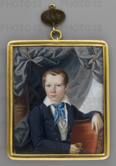 Count Razumovski as a boy, Leon Lev Grigorievich Razumovsky? 1816–1868. Robert Theer 1808–1863 painter. Interior palace/chamber. Male portrait, slightly turned left; waist-high; boy. Foreign miniature. 1826, Austria. Miniature; height 7.1 cm, width 5.9 cm., A rectangular miniature portrait in a gold frame shows a young person with light skin and short brown hair wearing a dark blue jacket, a white shirt with a high collar, and a bright blue neck scarf; they sit with one arm resting on a red-upholstered chair and the other hand holding a patterned object. Behind them is a draped fabric backdrop in shades of gray and dark blue with folds and highlights. The frame has a gold loop and small oval tag at the top. Visible colors include gold, blue, gray, white, red, brown, and flesh tones.