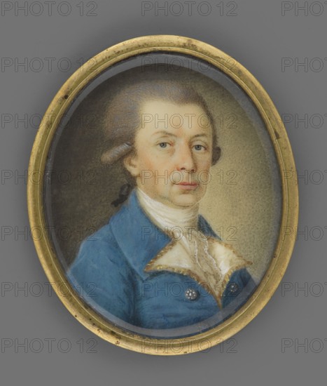 Portrait of a Man in a Blue Tailcoat with Diamond Buttons, Unknown Artist. Male portrait wig, 3/4 left bust. Foreign miniature, 1780. Gray wig with ponytail. Blue tailcoat with white lapels braided with gold along the edge, white cravat and jabot, diamond buttons. Background gray-brown lightened on the right. Miniature; height 3.9 cm, width 3.3 cm. Secondary narrow brass frame. Repossession provenance., An oval framed painted portrait of a man shown from the chest up, wearing a blue coat and a pale, ruffled neckcloth; he has light skin, light brown hair pulled back and tied, light-colored eyes, and a neutral expression. The background inside the oval is a muted brownish-beige that darkens toward one side, and the frame is a worn gold color. Overall visible colors include blue, pale cream, beige, brown, gold, and subtle pinkish tones in the face.