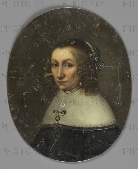 Portrait of an elderly woman, unknown artist. Subject: clergy, woman in three-quarter bust 3/4 left. Style/type: miniature, ca. 1650, possibly Rome. Materials/format: height 18.8 cm, width 15.2 cm. Depicted: shoulder-length smooth blond hair, black beret embroidered with pearls, black dress with a stiff white collar falling over the shoulders, small pearls at the neck; jewelry: pearls. Attributes: portrait, female, rulers, clergy, monasteries; Vasa dynasty coat of arms, Sweden coat of arms. Background plain, dark. Frame: none. Inscriptions/marks on reverse in pencil: Gift of Storkhansen ? /Nr. 98/; white paint: 15.III.38., An oval painting shows a portrait of a seated person turned slightly to the viewer's right with a pale face and a neutral expression, light brown curly hair styled at the sides and adorned with a dark headpiece with bead-like details, and dark eyes looking forward; they wear a light-colored wide collar with a decorative bow and a pendant, a dark garment beneath, and ...