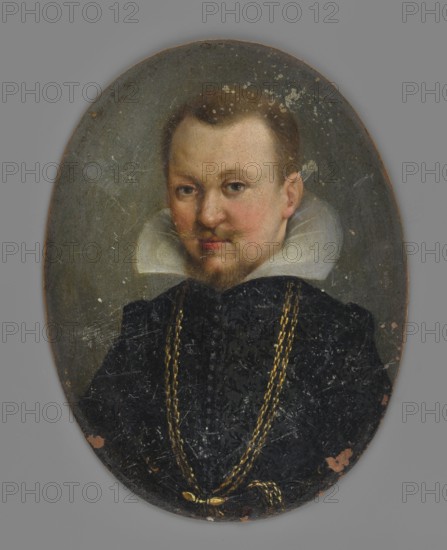 Portrait of a man, unknown artist, jewelry, clothing, three-quarter male portrait, foreign miniature. Torso slightly to the left; blond hair, short, smooth; blond mustache, short beard. At the neck, a white, smooth ruff; a black doublet fastened in the center with a long row of small buttons; a double gold chain reaching to the waist. Background: ash-gray. Frame: missing. Date: 1650–1670. Miniature, height 8.8 cm, width 6.8 cm., An oval portrait of a person with light skin and short brown hair, showing a neutral expression and a small mustache and goatee; they wear a high white ruffled collar and a dark textured garment with a long gold chain draped over it, and the background is a muted gray-green with some areas of lighter and darker discoloration.