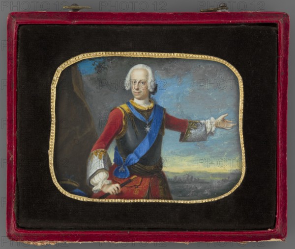Louis VIII, Landgrave of Hesse-Darmstadt 1691–1768 Jagdlandgraf, attributed to Johann Christian Fiedler 1697–1765. Standing figure, visible to the knees, turned 3/4 to the right; left hand pointing toward the battle, right hand on the hilt of a sword. White wig with ponytail and black cockade, white shirt, red uniform with high white cuffs and gold braiding, black cuirass with yellow lapels, caftan with brown and black ribbon at the waist, sapphire ribbon with a cross at the neck, ribbon of the Order of the Golden Fleece over the left shoulder, black regimental baton with a yellow tip in the right hand. Background: left a brown tent canvas; cloudy blue-gray and yellow sky, gray landscape, silhouettes of soldiers and a battle in the background. Subjects: rulers, landscapes, soldiers, portraits to the waist, men. Medium and format: miniature, paper binding, plush red leather case. Dimensions: height 4.5 cm, width 5.8 cm. Date: 1750. Place of origin: Germany., A framed miniature portrait ...