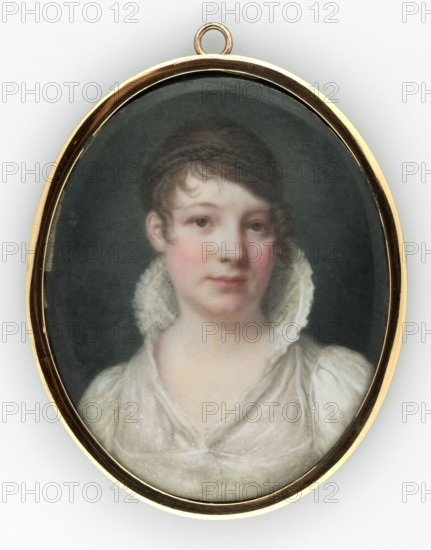 Portrait of a Woman in a White Empire Dress, Aldenrath, Heinrich 1775–1844 painter; dresses Empire with ruff, women, portraits shoulder-length, hairstyles bun, female portraits right, foreign miniatures, repossession Jelenia Góra, Bust, head slightly to the right. Dark blond hair, brown eyes, white Empire dress with a small ruff at the back. Background: dark grey. Binding: thin, oval brass frame. 1809, Germany. Miniature; height 6.8 cm, width 5.4 cm., An oval miniature portrait set in a gold frame shows a young woman from the shoulders up against a dark background; she has light skin with rosy cheeks, brown hair styled close to her head with a curled lock at the forehead and a longer curl at one side, and a calm, neutral expression. She wears a white, semi-sheer dress with a high, ruffled collar and puffed sleeves, the fabric appearing dotted and slightly translucent, and the visible colors in the image include gold from the frame, dark gray and black in the background, brown in the ha...