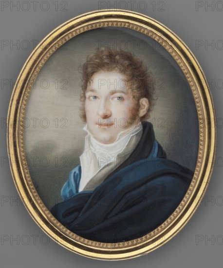 Portrait of the painter Henryk Zabiello 1785–1850 by Franciszek Ksawery Olexinski 1758–1826. Half-length facing left. Rusty-blonde hair, short, in curls; slight sideburns. Wearing a white tied cravat, cream vest, black tailcoat with a blue scarf under the collar, and a pleated dark sapphire coat draped on one shoulder. Background: light olive sky with darker clouds and tree silhouettes. Gilded bronze frame. 1819, Poland. Miniature, height 7.0 cm, width 5.6 cm., An oval framed portrait of a light-skinned person with curly brown hair wearing a high white collar and a dark blue cloak, set against a muted gray-green background; the frame is gold with decorative inner edging and the visible colors include gold, brown, white, blue, gray, green, black, and flesh tones.