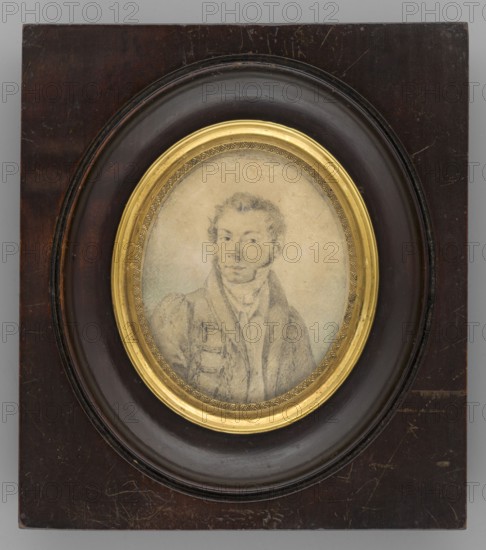 Self-portrait of the Artist, Rogozinski, Antoni Wincenty 1797–1835. Miniature, 1832. Three-quarter-length self-portrait of a young man, oval face, short wavy hair, long sideburns, upturned nose, turned left. He wears a coat decorated with braiding over a dark frock coat with a high collar, white shirt, scarf, and vest. Grey-bluish background. Oval profiled light brass frame decorated with a row of stylized engraved palmettes, set in a rectangular profiled frame of brown-stained ash wood. Dimensions: height 6.4 cm, width 5.2 cm., self-portrait, male portrait, painters, costumes, hairstyles, Polish miniature., A framed oval portrait set in a rectangular wooden plaque, with a dark brown wooden outer panel and a circular recessed inner molding in a darker brown, surrounding a gilded oval inner frame; inside the gilded frame is a faded pencil or graphite sketch of a young man wearing a jacket and scarf, drawn in soft gray tones with pale beige paper background and slight greenish shading ar...