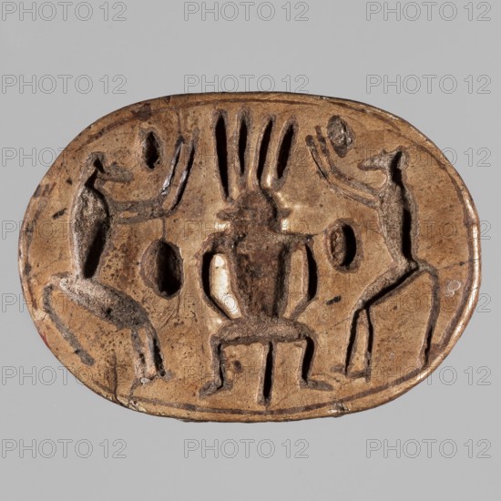 Scarab with a depiction of two baboons adoring Bes; on the reverse, a convex image of a scarab occupies the center of the oval surface, decorated with engraved parallel lines. ca. 1295–1186 BC; New Kingdom, 19th–20th Dynasty, Egypt. Scarab amulet; height 2.5 cm, width 3.6 cm., An oval, carved object in brown and tan tones sits against a light gray background; the surface shows a darker brown central figure seated on a low stool with elongated vertical elements rising above its head, flanked by two upright humanlike figures on either side that face inward with raised arms; the left and right figures and the central figure are carved in relief with visible grooves and rounded depressions around them, and the object's edges show slight wear and darker speckling.