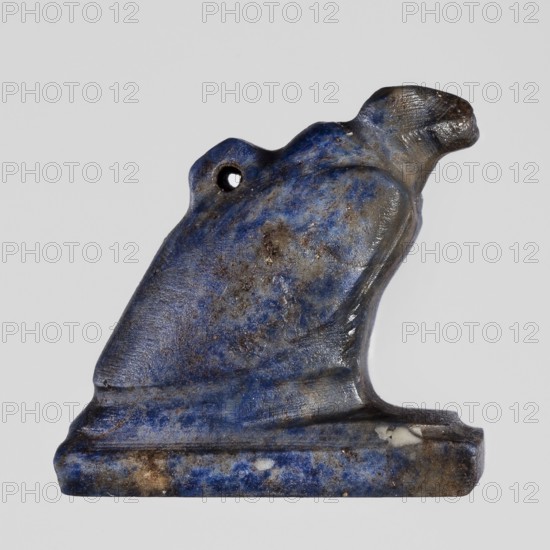 Amulet - vulture, Goluchów Greater Poland Voivodeship, vultures, birds, pendant, sitting on a base, with a pendant on the back, ca. 1550–1069 BC; New Kingdom, Egypt, amulet, height 1.3 cm, width 1.8 cm, A small carved object shaped like a stylized animal sitting on a rectangular base, with a rounded head, a short beak-like snout, and a small hole near the top; the surface shows a mottled mix of deep blue, lighter blue, gray, brown, and some white spots, with visible texture and areas of wear and slight pitting.