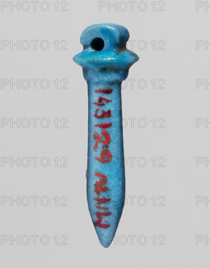 Amulet — papyrus scepter; amulet in the shape of a scepter topped with a papyrus canopy. 664–525 BC; Late Period, 26th Dynasty, Egypt. Material: papyrus?; height 2.5 cm, width 1.9 cm., A small, elongated object shaped like a tapered peg with a rounded top and a hole near the top, shown against a plain light gray background; the object is primarily bright turquoise blue with a few areas of darker blue and some small brownish spots, and it has a vertical series of short red markings along its shaft.