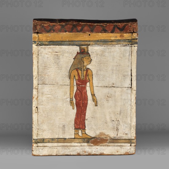 Canopic box, Sons of Horus mythology, falcons, jackals, Isis mythology, Nephthys mythology; grave goods, Egyptian deities; ca. 747–656 BC, Third Intermediate Period, 25th Dynasty, Egypt; canopic box; height 28.5 cm, width 22 cm, depth 29 cm, A painted wooden panel showing a standing human figure in profile facing right, wearing a long red garment and yellow skin tone, with long dark hair and a small rectangular headdress; the figure is outlined in dark lines and stands on a narrow horizontal band near the bottom. The panel background is off-white with visible wood grain and worn areas, and there are bands of yellow, blue, and dark red along the top edge, with a patterned dark red and black strip at the very top. The overall palette includes off-white, red, yellow, blue, black, brown, and hints of green, and the surface shows cracks, chips, and areas of flaking paint.