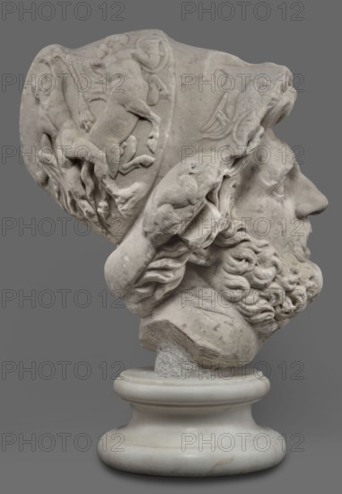 Head of Menelaus from the Menelaus Carrying the Body of Patroclus group, unknown artist. Head of a bearded man wearing a helmet, with an expressive face shown by wide-open eyes and parted mouth, emphasized by chiaroscuro effects from the contrast between lush locks of beard and hair emerging from under the helmet and the smooth skin of the face. The face conveys a man experiencing dramatic moments. The helmet is adorned with relief decoration depicting fantastic creatures: on each side a centaur fighting a Greek, and below on the edge a triton figurine. The sculpture is a Roman copy of the head from a Hellenistic bronze composition depicting Menelaus with the body of Patroclus. Menelaus, Helen's husband, is the first to fight to retrieve the deceased's body and then carries it from the battlefield so it can be buried according to ritual. The death of Patroclus, Achilles' friend, is a pivotal moment in the Trojan War, bringing Achilles back into the fight and affecting the war's outcome...