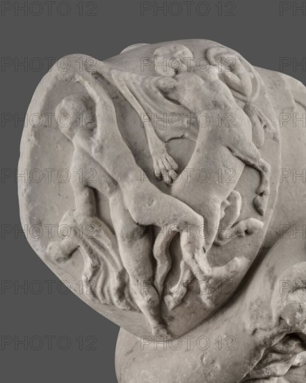 Head of Menelaus from the Menelaus Carrying the Body of Patroclus group. Head of a bearded man wearing a helmet, with an expressive face shown by wide-open eyes and parted mouth, emphasized by chiaroscuro effects from the contrast between lush locks of beard and hair emerging from under the helmet and the smooth skin of the face—the face of a man experiencing dramatic moments. The helmet is adorned with relief decoration depicting fantastic creatures: on each side a centaur fighting a Greek, and below, on the edge, a triton figurine. The sculpture is a Roman copy of the head from a Hellenistic bronze composition depicting Menelaus carrying the body of Patroclus. Menelaus, Helen's husband, is first to fight to retrieve the deceased's body and then carries it from the battlefield for burial; Patroclus’s death is an important moment in the Trojan War, bringing Achilles back into the fight and affecting the war’s outcome. Date: 1st half of the 2nd century AD reign of Hadrian, 117–138. Roma...