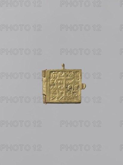 Diptych: Old Testament Holy Trinity and the Mother of God Znamienije, Old Believers' workshop; Mary mother of Jesus Christ; the Mother of God Znamienije iconographic; the Holy Trinity iconographic; angels; diptychs; the Mother of God with the Child iconographic; tree iconographic; mountain iconographic; inscriptions; Old Believers; maphorion iconographic; Golgotha iconographic. On the two wings of the diptych there are images of the Mother of God with Christ Emmanuel on her breast—in a round medallion—and three angels sitting behind a trapeze. Identifying inscriptions are placed on both sides of the images. Dimensions: 3 x 3.7 x 2; height 3 cm, width 7.5 cm. Date: 18th–19th century. Origin: Russia. Object type: icon, diptych., A small square metallic object with a hinged side, shown against a plain light gray background; the object is a dull gold color with textured, raised patterns on its surface, including a central cross-like raised area and ornamental designs around it, and there i...