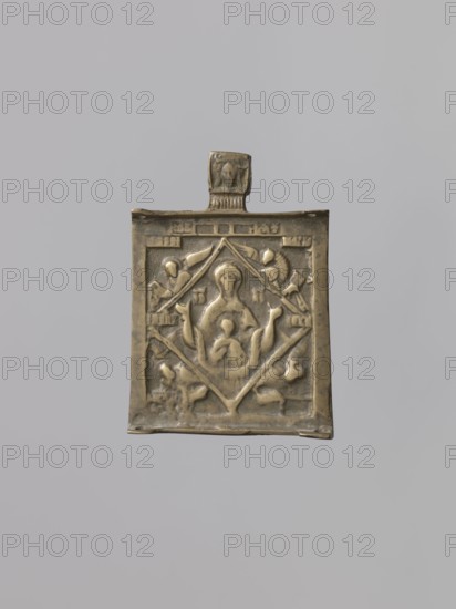 Middle wing of the triptych: Our Lady of the Signs and symbols of the four Evangelists, Russian workshop, Mary mother of Jesus Christ, Our Lady of the Signs iconography, Jesus Christ Bible, Mandylion iconography, evangelists, orantes, Our Lady and Child iconography, angels, bulls, inscriptions, lion iconography, eagle iconography. In the center of the icon is depicted – in bust form – Our Lady of the Signs with the image of Emmanuel blessing Christ on her breast. She is shown against a rhombus background; the icon's corners depict the symbols of the Evangelists. The face of the Savior not created by human hands is visible on the pendant. The relief of the cast is worn over the entire surface. 16th century, Veliky Novgorod probably, triptych middle wing, height 7.5 cm, width 5.5 cm, A small rectangular metal pendant with a tab at the top, shown against a neutral gray background. The pendant has a raised central panel with a stylized figure seated in the middle and a smaller figure in fr...