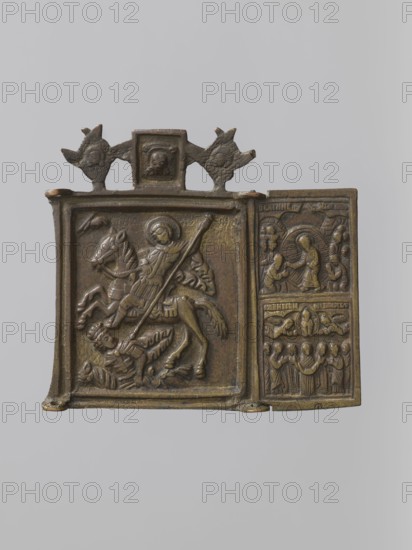 Two wings of a prayer triptych: St. Demetrius of Solon and images of church feasts; Russian workshop; Ascension iconographic; Descent into Hell iconographic; spears; Demetrius of Thessalonica St., ca. 280–ca. 304; Lias iconographic; horse iconographic; Mandylion iconographic; cherubim; Hand of God iconographic; Resurrection of Christ iconographic; Jesus Christ Bible; saints; martyrs; warrior saints; ripides. In the middle wing, on a rearing horse, St. Demetrius is shown driving a spear into the body of Lias, who lies under his hooves. The preserved side wing depicts the Descent into Hell and the Ascension. Above the central wing is the Mandylion, framed by two cherubs. The cast form is simple and slightly archaic. The left side wing is missing, and the upper left hinge is damaged. 18th century, Russia. Triptych two wings; height 8.5 cm, width 9.3 cm., A small rectangular metal plaque with a hinged narrow panel on the right, cast in a brownish bronze tone with areas of darker patina; th...