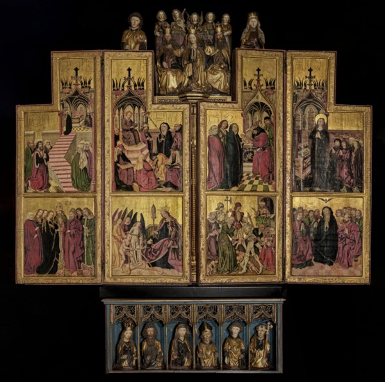 Annunciation with Unicorn Polyptych, Master of the Annunciation with Unicorn Polyptych, 4th quarter of the 15th century ca. 1480, tempera and gold on panel polyptych with painted wings and sculpted elements; subject: Annunciation of Mary and unicorn iconography; medieval Silesian wing altar St. Elizabeth's Church, Wroclaw; inscriptions/notes on attribution: various scholars dated it ca. 1460–1500 and linked it to the Master's workshop; connections noted to the graphic art of Martin Schongauer engravings cited as models and to Master ES engraving L 61, 1467; stylistic dependence suggested on the Nuremberg Master of the St. Wolfgang Altarpiece; possible single-artist execution for both sculptures and paintings around 1480., A large multi-paneled altarpiece with a gold background fills the image, composed of tall rectangular panels arranged in a stepped formation with hinged wings; the painted scenes contain a group of carved and painted figures at the top center in muted golds and creams...