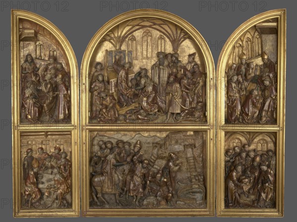 Triptych with the legend of St. Stanislaus, unknown sculptor, Hans von Kulmbach ca. 1485–1522 painter, legend of St. Stanislaus, Stanislaus of Szczepanów ca. 1030–1079, masterpiece, compare: brass crowns from the head of King Boleslaw secondary, crosier from the scene of the Murder of St. Stanislaus secondary, 1510–1520, Plawno parish church, Kraków place of origin, altar, bas-relief, A carved triptych with hinged side panels and a central arched panel, all set in a gold frame, showing detailed relief scenes populated by a group of figures in flowing robes and headpieces. The carving displays a palette of gold, brown, reddish-brown, and muted gray tones, with highlights of brighter gold on the frame and background surfaces. The upper central arched scene features several figures gathered under vaulted arches, some standing and some kneeling, with draped garments and varied headdresses. The upper left and upper right arched panels each contain groups of figures in similar robes and head...