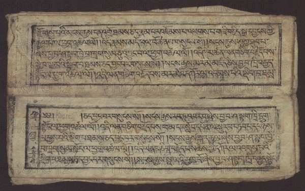 Buddhist text - Formula of repentance Tib. sdig bshags gser gyi spu gri bzhugs so, unknown author, Buddhist art, Tibetan, graphic prints, Book in the Tibetan pecha style, xylographic print in the disciple script dbu can, 16 folios, folio numbering 2-15 recto, first verso. Print on thin handmade paper, clear translucency. 19th century, Tibet. Graphic, width 25.5 cm, height 7.8 cm, A worn rectangular manuscript page with a dark brown background, showing two framed horizontal panels filled with dense black ink script on aged beige paper; the paper has uneven edges and a few creases, with areas of darker brown staining and smudging, and the frames around the text are drawn in black ink that appears slightly faded in places.