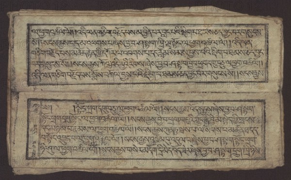 Buddhist text - Formula of repentance Tib. sdig bshags gser gyi spu gri bzhugs so, unknown author/graphic artist, Buddhist art, Tibetan, graphic prints, Book in the Tibetan pecha style, xylographic print in the disciple script dbu can, 16 folios, folio numbering 2–15 recto, first verso, print on thin handmade paper with clear translucency, 19th century, Tibet; graphic; width 25.5 cm, height 7.8 cm., An aged rectangular sheet with a textured beige background and frayed edges fills the image, containing two horizontally aligned rectangular panels each outlined with a dark border; the panels hold rows of dark inked script-like marks that are evenly spaced and flow across the panels, with a narrow seam of lighter paper between the panels and darker worn areas along the outer edges; the overall palette includes beige, cream, dark brown, and black, with subtle darker smudges and spots scattered across the surface.