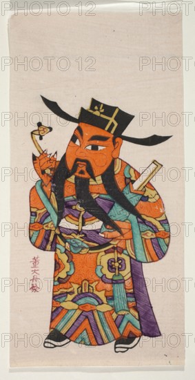 Menshen Gate Guardian in civilian costume, Chinese, nianhua New Year's Day picture, early 20th century, Jiajiang, woodblock graphic print, height 33.0 cm, width 16.5 cm, A stylized figure wearing a tall black hat with gold accents and a long black beard stands against a pale beige background. The figure's face and hands are orange with bold black eyebrows and mustache, and the eyes are almond-shaped with white and black details. The robe is richly patterned with vibrant colors including orange, purple, teal, green, yellow, and black, featuring swirling motifs and geometric shapes. The figure holds a small object near the face in one hand and a rectangular object in the other, and a long black sash or ribbon extends from the hat. The footwear is black and white, and there is a purple panel visible along the side of the robe.