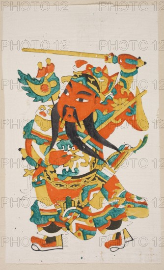 Menshen Gate Guardian, nianhua New Year's picture showing a warrior in costume, early 20th century, China; graphic print; height 35.3 cm, width 24.0 cm., A colorful stylized figure fills the image, depicted with a large red face and long black beard, wearing ornate layered garments and armor in bright hues of red, yellow, teal, green, black, and orange. The figure holds a long yellow staff and is surrounded by decorative elements including ribbon-like shapes, curved ornamental forms, and a few stylized animal or bird motifs rendered in teal, yellow, and red. The clothing and accessories show patterned sections and rounded shapes with accents of teal and green, and the boots are red with white soles. The background is a pale off-white with a slightly textured, beige border.