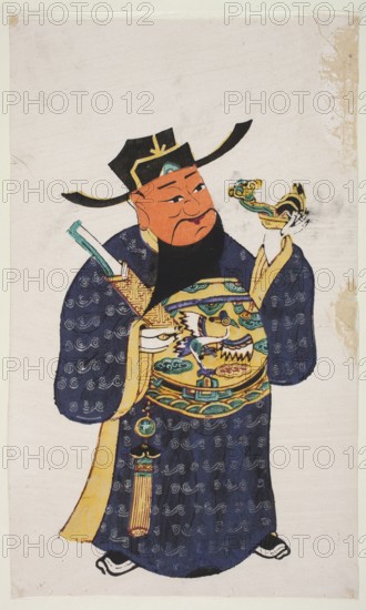 Menshen Gate Guardian, unknown artist, woodcut, nianhua New Year’s picture, Chinese, early 20th century; graphic print, height 39.0 cm, width 25.5 cm; iconography: Menshen gate guardian., A full-length depiction of a robed figure standing against a pale background, wearing a dark hat with gold trim and a black beard, with an orange-toned face and a neutral expression; the figure is dressed in a deep blue robe patterned with light swirl motifs and trimmed with yellow, featuring a large decorative circular panel on the chest with green, yellow, and teal designs including a stylized creature motif, and holding a small ornate cup or vessel in one hand that shows green, yellow, and teal colors and a sinuous decorative element; additional accessories include a hanging pendant and tassel in yellow and teal, a pale blue object tucked at the shoulder, and black and white shoes visible beneath the robe.