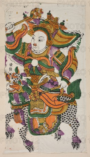 Menshen Gate Guardian, Chinese, nianhua New Year's picture, Guardian depicted as a warrior riding a mythical qilin, early 20th century, Shaanxi, woodblock print/graphic, height 44.0 cm, width 23.5 cm, The image shows a colorful painted figure wearing ornate armor and a richly decorated headdress, seated on a stylized animal with patterned legs and clawed feet; the figure has a pale face with defined facial features and holds a long rod or weapon above its head, with clothing and accessories rendered in bright colors including orange, green, purple, yellow, black, and white; the headdress and armor feature swirling and scalloped decorative motifs, the animal beneath has scale-like patterns and green mane elements, and the overall composition is on a pale, slightly creased background.