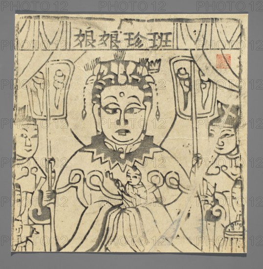 Goddess protecting against measles; nianhua New Year picture, early 20th century, Shandong; Chinese; protective deities iconography; graphic print; height 19.5 cm, width 19.5 cm;, A central seated figure with a round face and ornate headdress is flanked by two standing attendants, all rendered in black ink on a beige paper background; the central figure wears a patterned collar and flowing robes with curved decorative lines, and a smaller figure sits on the lap holding an object, while the attendants hold tall staffs and wear stylized garments; there are curtain-like shapes and rectangular panels behind the figures, a small red square stamp near the upper right edge, and the image is framed by a thin darker border against a gray background.
