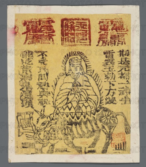 Buddha sitting on a cow; amulet print nianhua, New Year's picture serving as an amulet against illness; Chinese; early 20th century; graphic print; height 15.0 cm, width 13.2 cm; subject: buddha iconography, cows., A rectangular print with a yellow background framed by a white border shows a central black ink line drawing of a seated figure with a halo-like radiating outline, wearing layered robes with patterned hems and holding hands near the chest, positioned atop a stylized animal with horns and a textured body. There are vertical columns of black linear markings flanking the figure on both sides and several red rectangular stamped marks near the top edge and a smaller red stamp near the lower right; the visible colors are yellow, black, red, white, gray, and a few faint pink smudges.