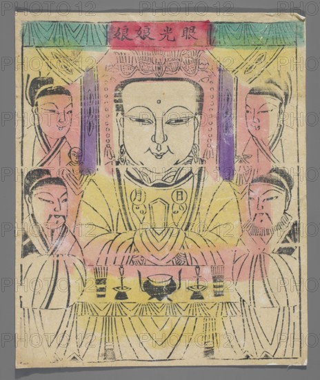 Goddess - guardian of good eyesight; nianhua New Year's picture, Chinese, early 20th century, Beijing; graphic print; height 30.0 cm, width 24.8 cm; protective deities iconography;, A central large figure with a calm facial expression sits flanked by a group of smaller figures, all drawn with black outline strokes on a pale beige paper. The central figure wears ornate headgear and layered clothing, and a few decorative elements hang beside the head. Several attendants stand on either side with distinct facial features and hair styles. In front of the central figure is a low table holding a small vessel and a few ritual objects rendered in black. Background areas show blocks and washes of color including yellow, pink, purple, green, and red, with linear decorative patterns near the top. The overall composition is framed by a narrow border and the edges of the paper show slight wear and discoloration.