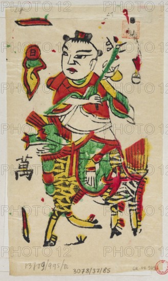Boy on a Deer, Chinese, nianhua New Year's picture, early 20th century, Lingbao; graphic print; height 17.7 cm, width 10.7 cm; motif: boy riding a deer., A colorful painted figure of a person wearing red and green clothing, with a neutral facial expression and stylized black hair, holding a long green object; the person sits astride an animal rendered in green, yellow, red, and black with patterned legs and a saddle-like decorative covering; surrounding elements include a few abstract shapes and small decorative motifs in red, yellow, green, and black on a beige paper background.
