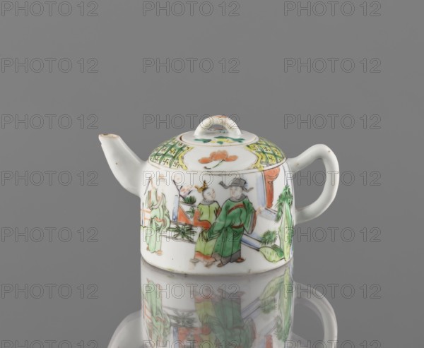 Teapot with lid;, ceramics; figurative scenes; teapot associated with Paderewski, Ignacy Jan 1860–1941; gardens motif; Chinese art/culture; colored porcelain; porcelain fragment; white, transparent glaze; decoration painted with overglaze enamel paints and iron red; 19th century, China; vessel; height 8 cm, width 14.3 cm, diameter 9.3 cm, A small porcelain teapot with a rounded body, short spout, and curved handle sits on a reflective surface against a plain gray background, showing its reflection beneath. The teapot is predominantly white with painted scenes of people in traditional dress in greens, reds, and blacks, and decorative motifs around the lid in green and yellow. The lid has a small loop handle that is white with touches of orange and green, and there are additional painted floral or botanical elements in green and orange on the body. The spout and handle are plain white with tiny brownish spots at the edges, and the overall color palette visible includes white, green, oran...