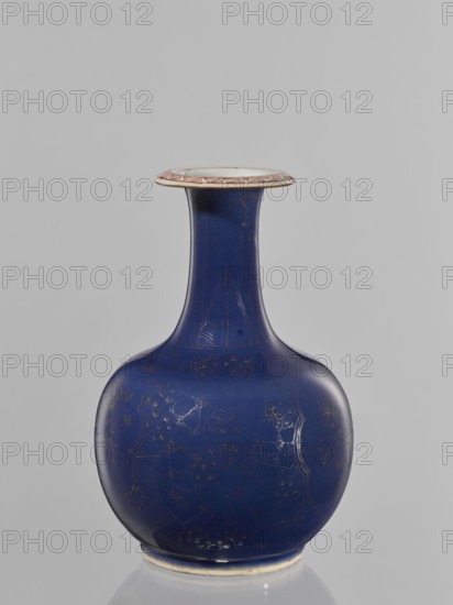 Kendi vessel, ceramic colored porcelain, artemisia motif, bottles, floral pattern, Chinese art, Qing style 1644–1911, kendi, reclaimed provenance, bulbous bottle with a long neck and flared spout, second side spout bell-shaped on the collar; border features flowers against a spiderweb background and artemisia leaves on the neck; 18th century, China, vessel, height 23.7 cm, diameter 16 cm, A rounded vase with a long narrow neck and a flared rim sits against a plain background; the vase is a deep blue with subtle lighter reflections and faint decorative motifs visible on its surface, and the rim has a pale inner band and an outer edge with reddish-brown patterned detailing, while the base shows a narrow pale ring contrasting with the blue.
